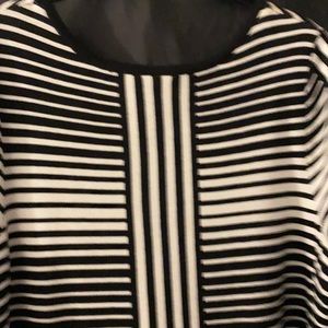 A black and white straight midway knit dress